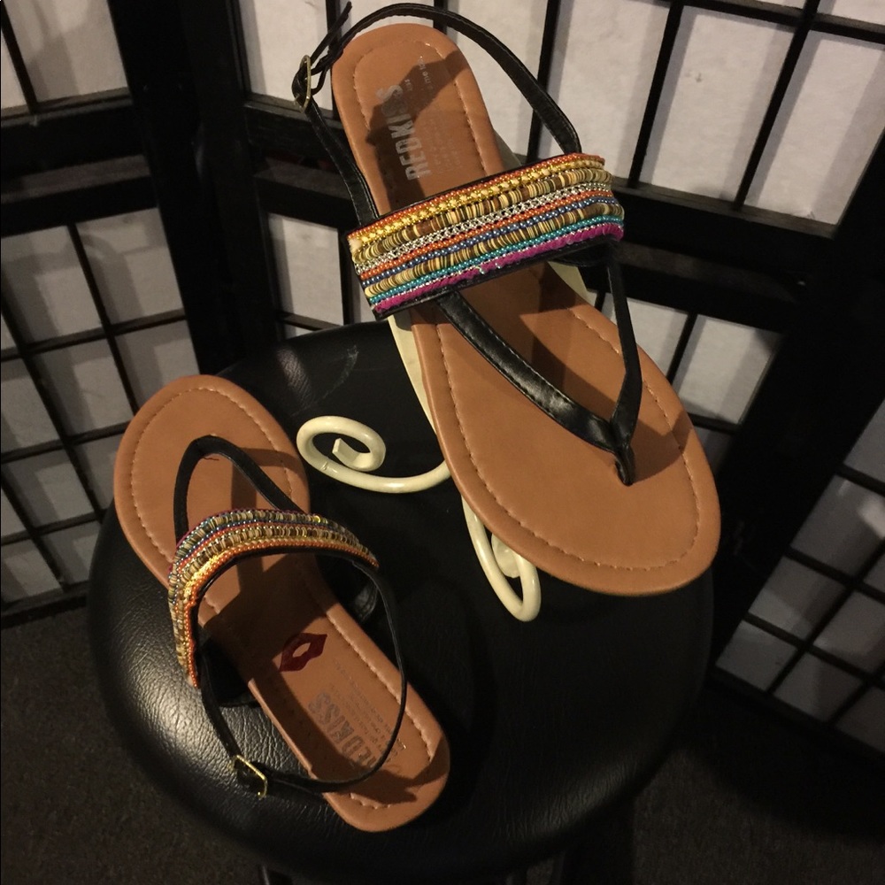 Black and brown sandals. New never worn.